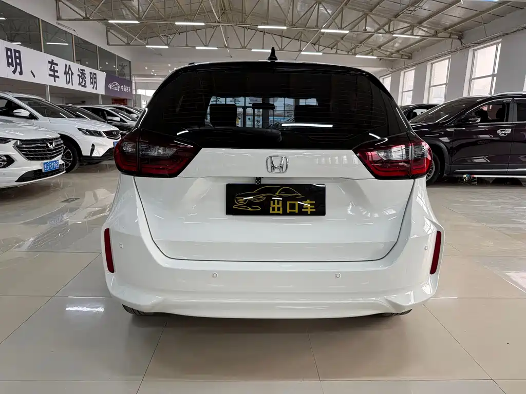 Honda Fit — фото 10
