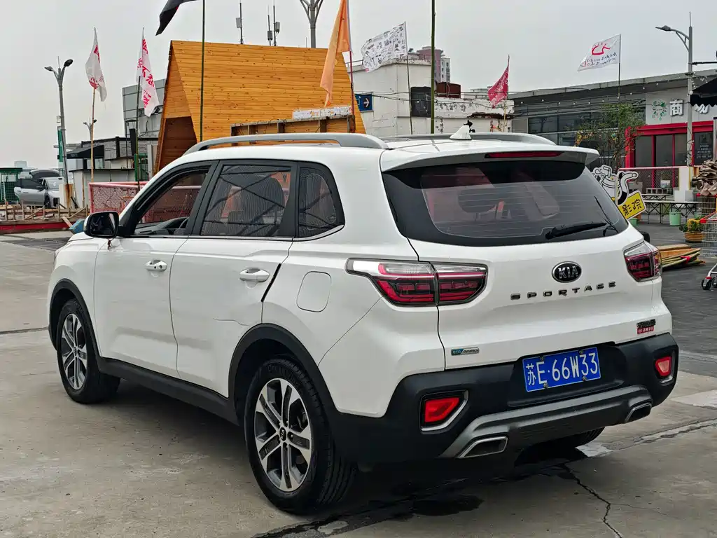 Kia Sportage — фото 7
