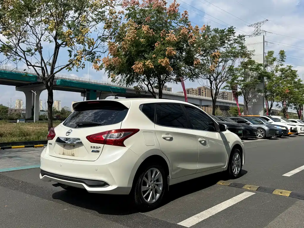 Nissan Tiida — фото 6