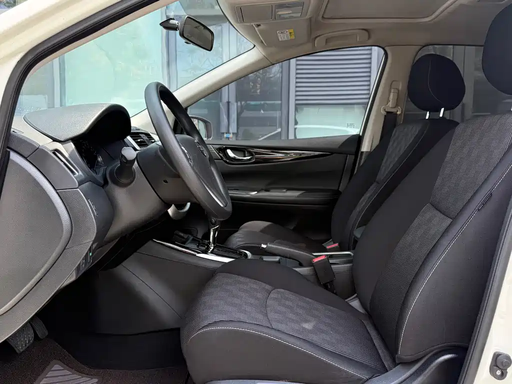 Nissan Tiida — фото 10