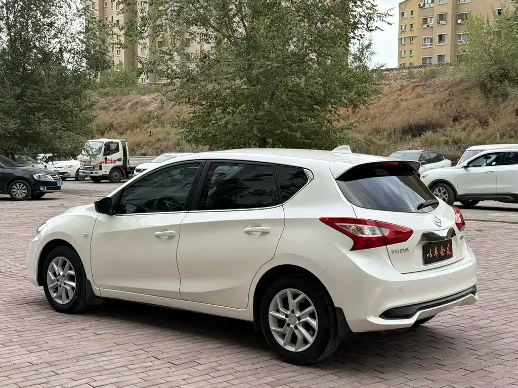 Nissan Tiida — фото 9