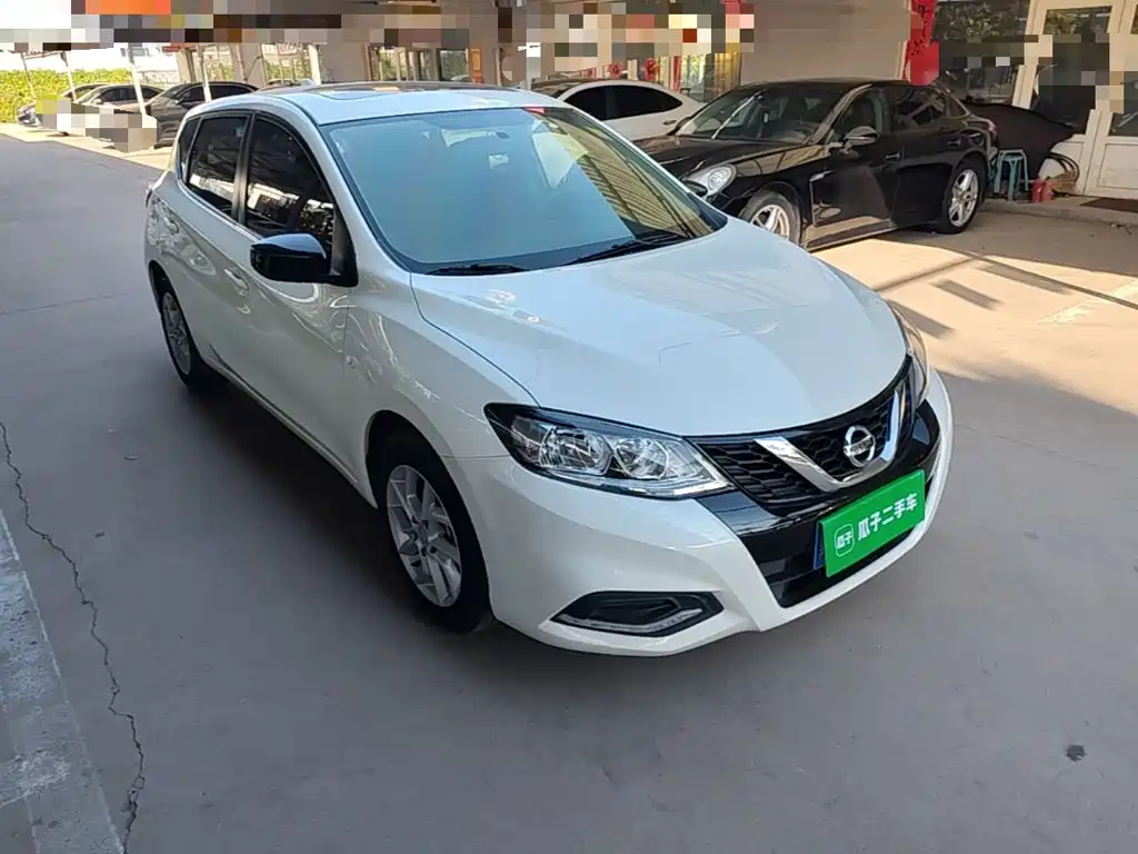 Nissan Tiida — фото 4