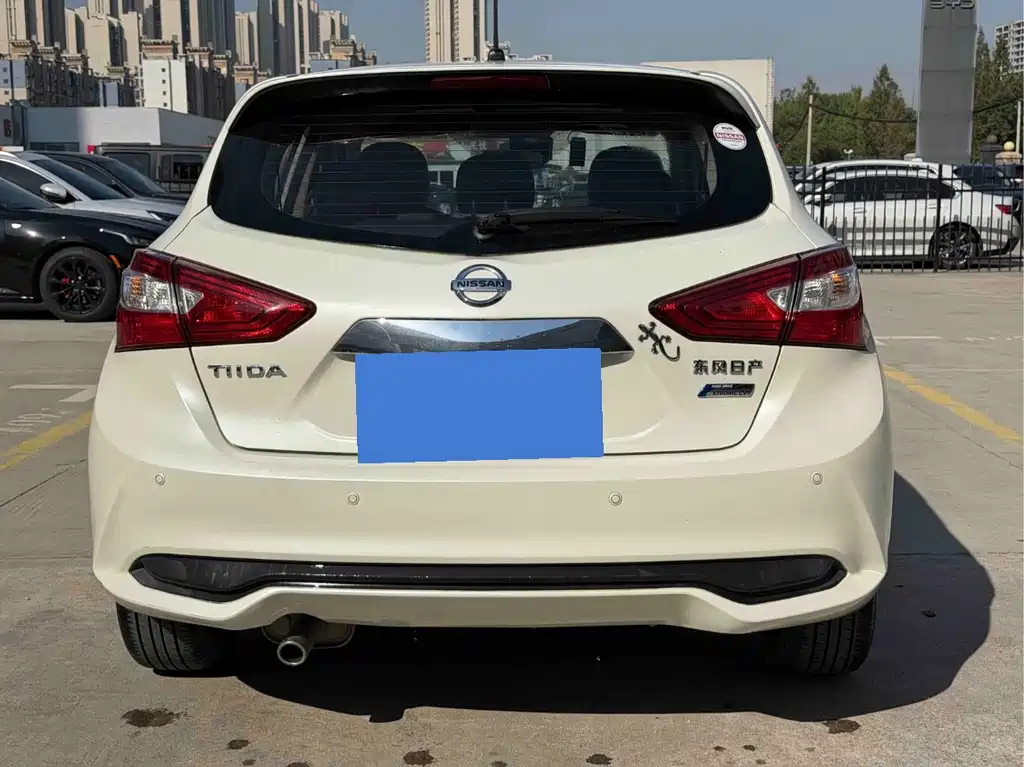 Nissan Tiida — фото 8