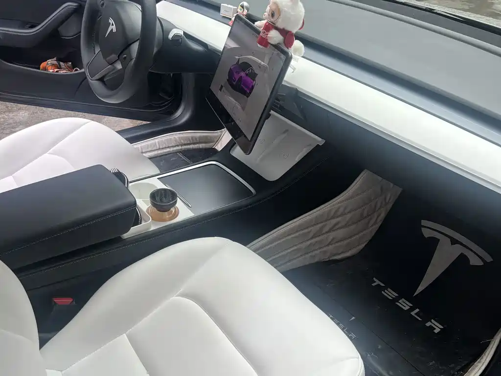 Tesla Model 3 — фото 11