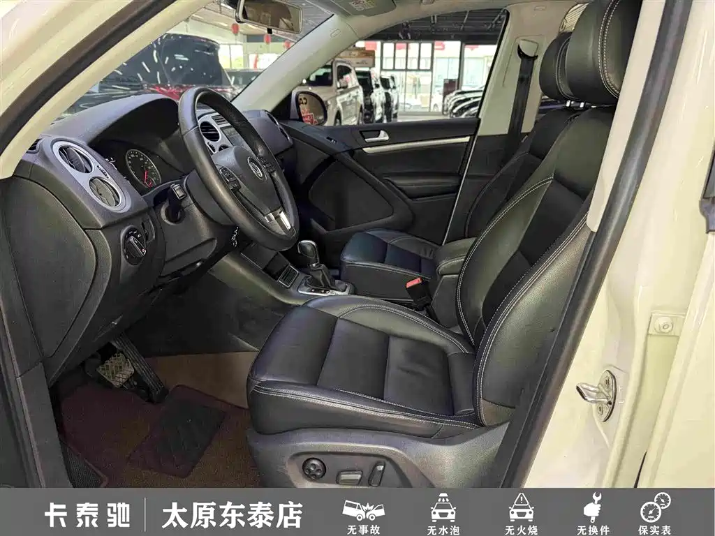 Volkswagen Tiguan — фото 17