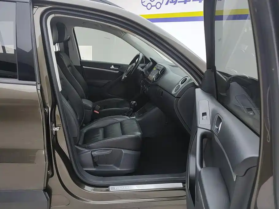 Volkswagen Tiguan — фото 8