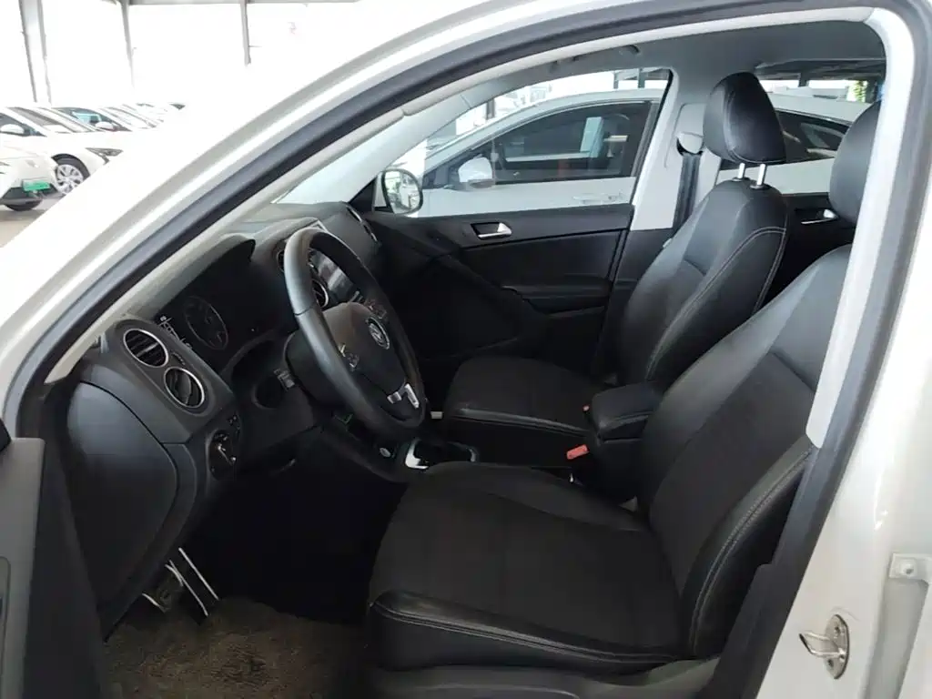 Volkswagen Tiguan — фото 15