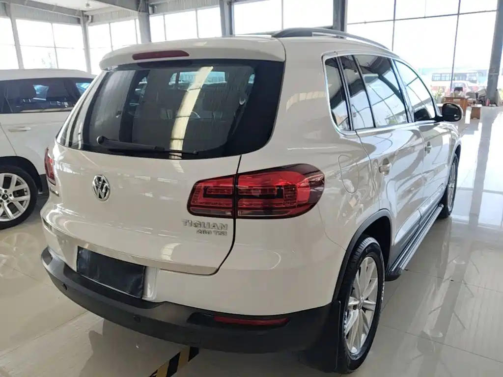 Volkswagen Tiguan — фото 7