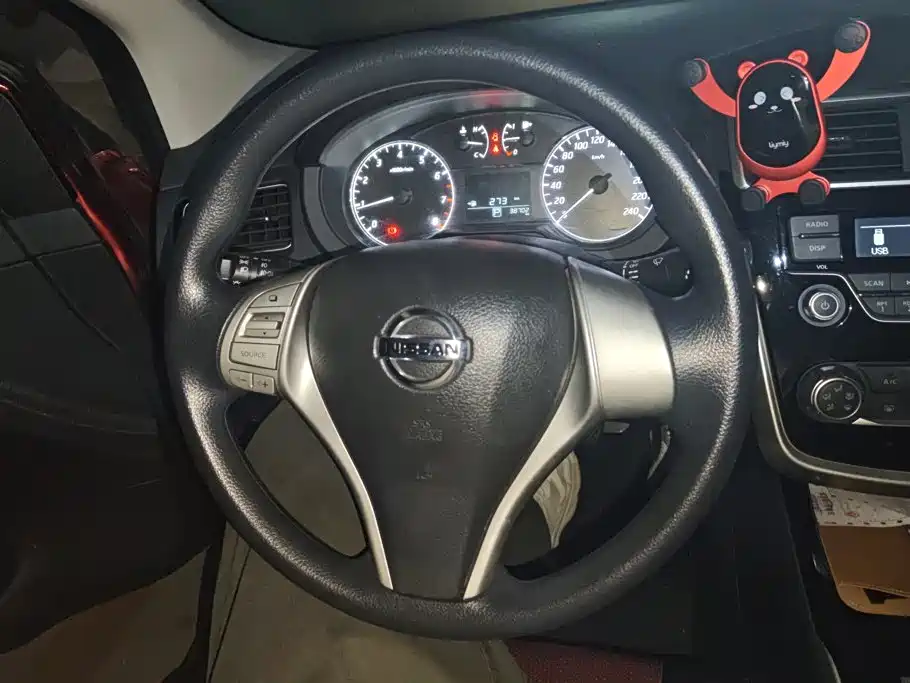 Nissan Tiida — фото 15