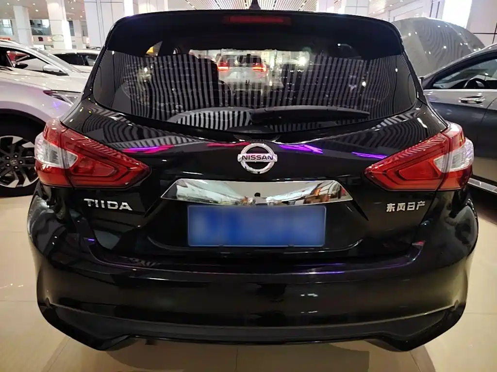 Nissan Tiida — фото 6