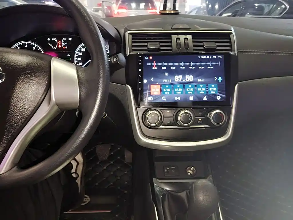 Nissan Tiida — фото 10
