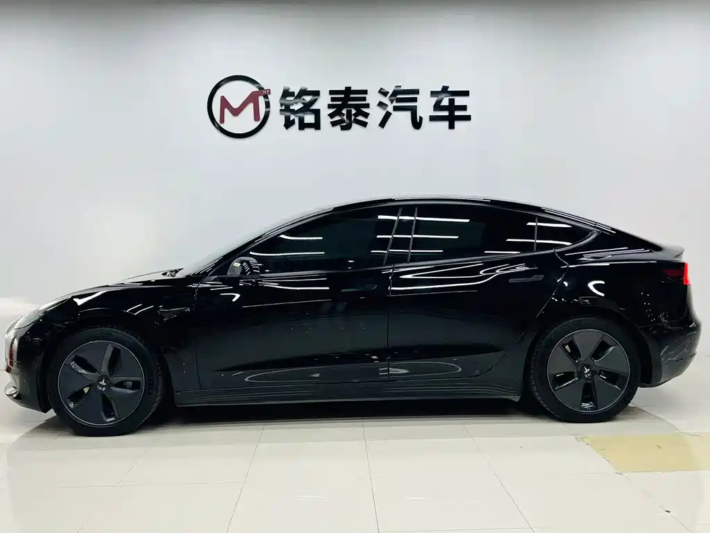 Tesla Model 3 — фото 3