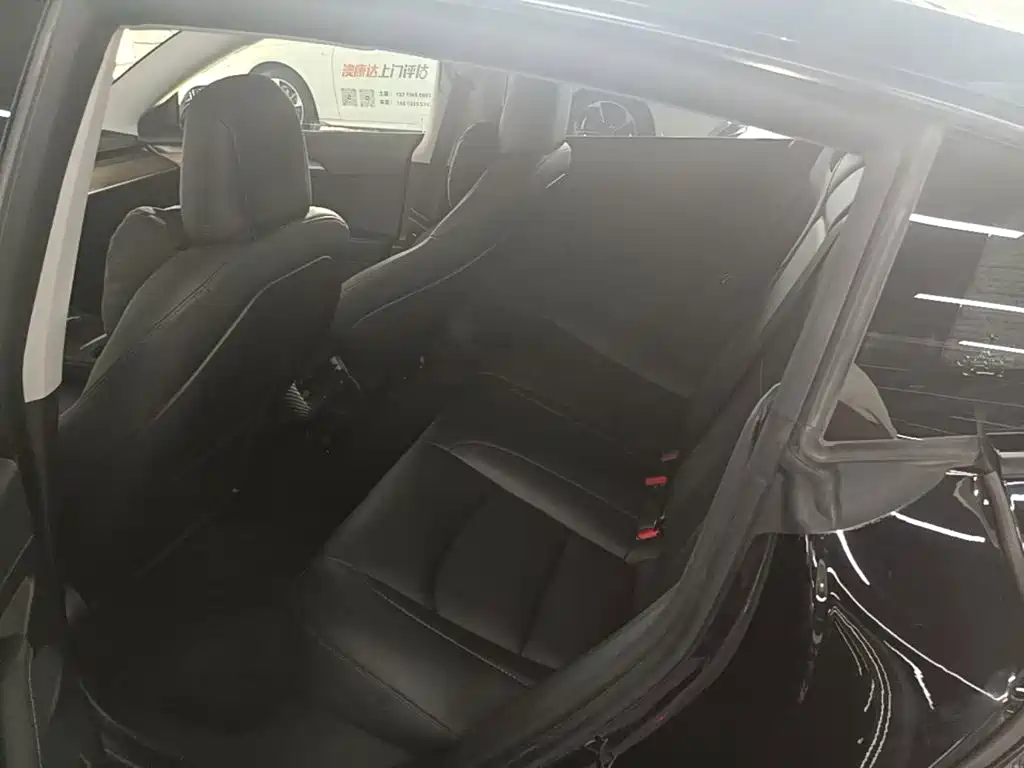 Tesla Model 3 — фото 17