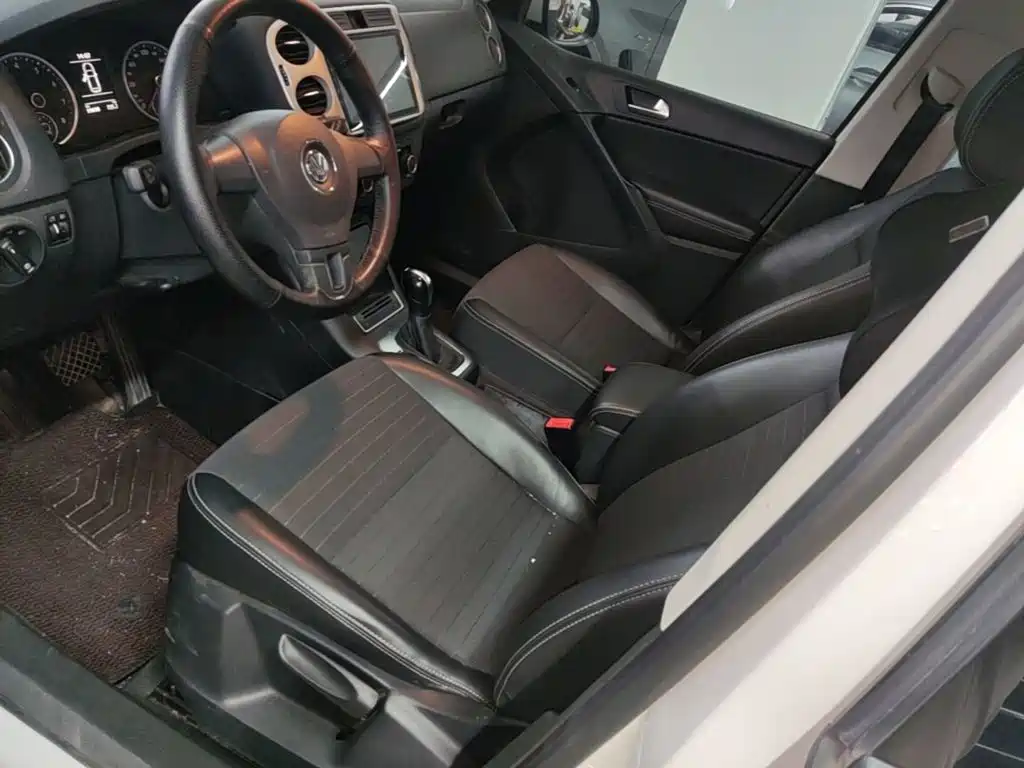 Volkswagen Tiguan — фото 15