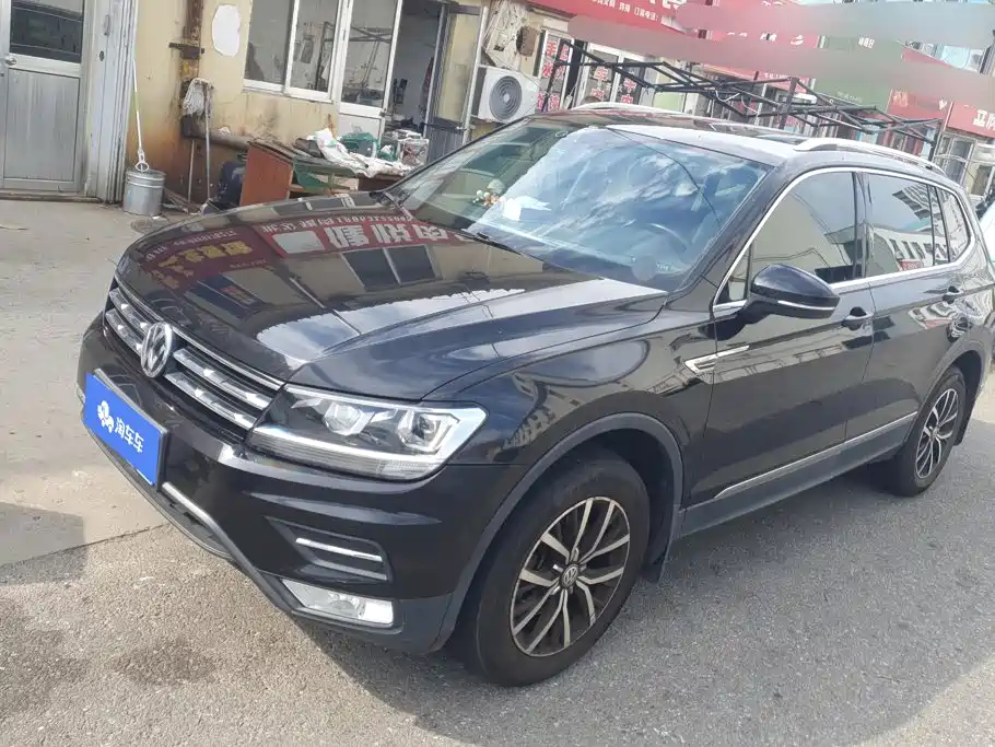 Volkswagen Tiguan L — фото 1