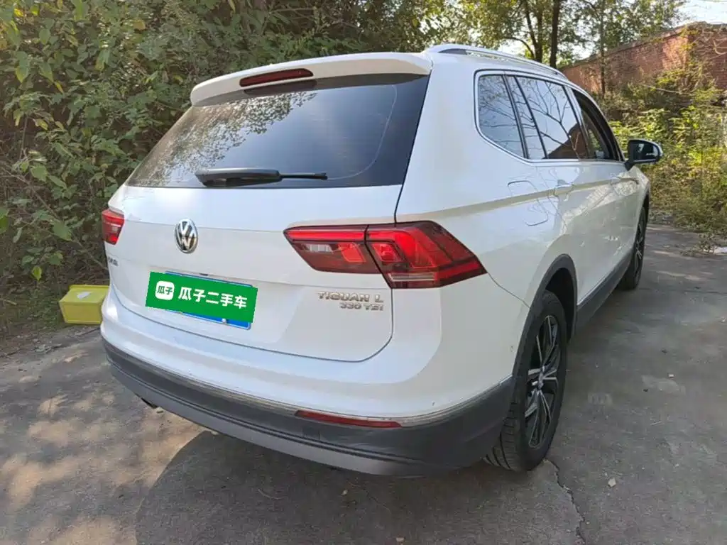 Volkswagen Tiguan L — фото 7