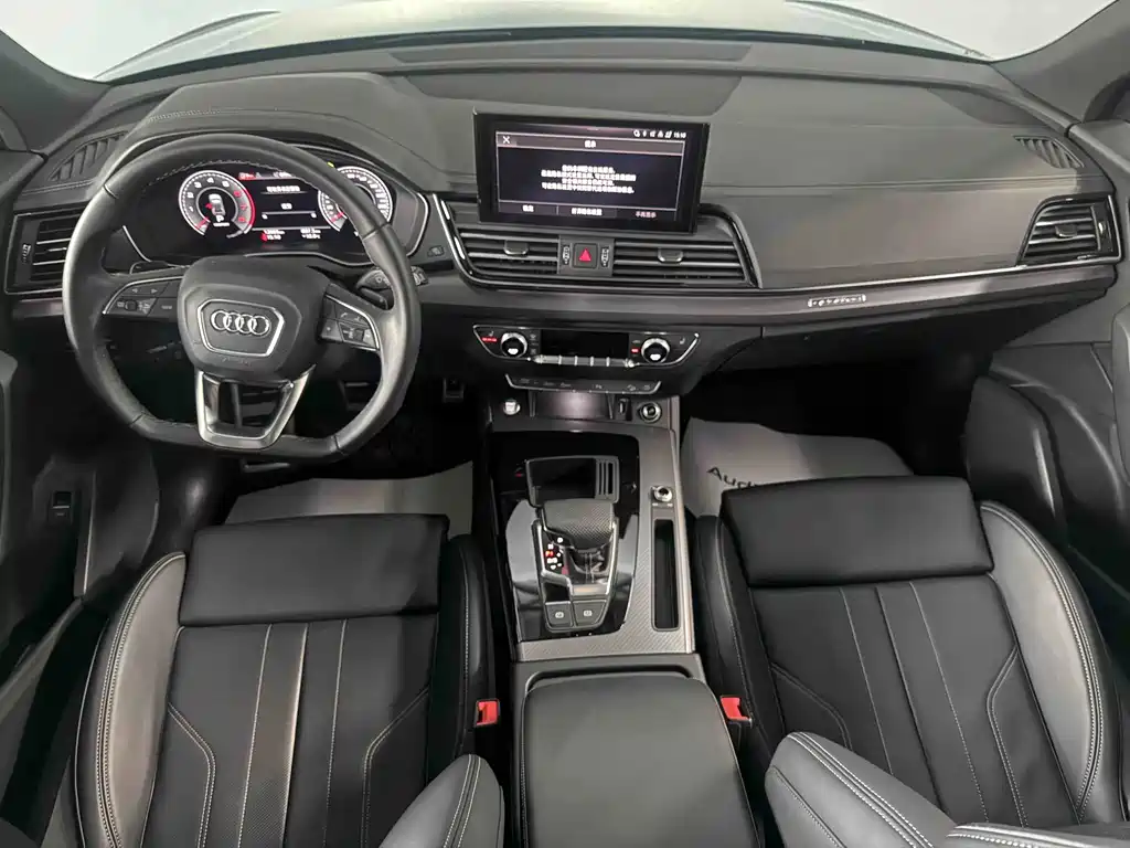 Audi Q5L — фото 6