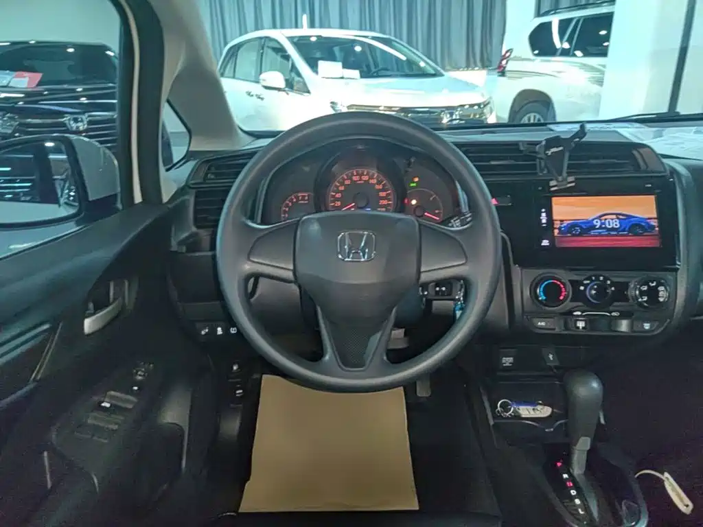 Honda Fit — фото 11