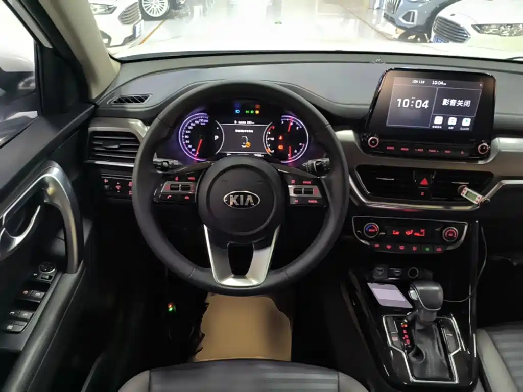 Kia Sportage — фото 11