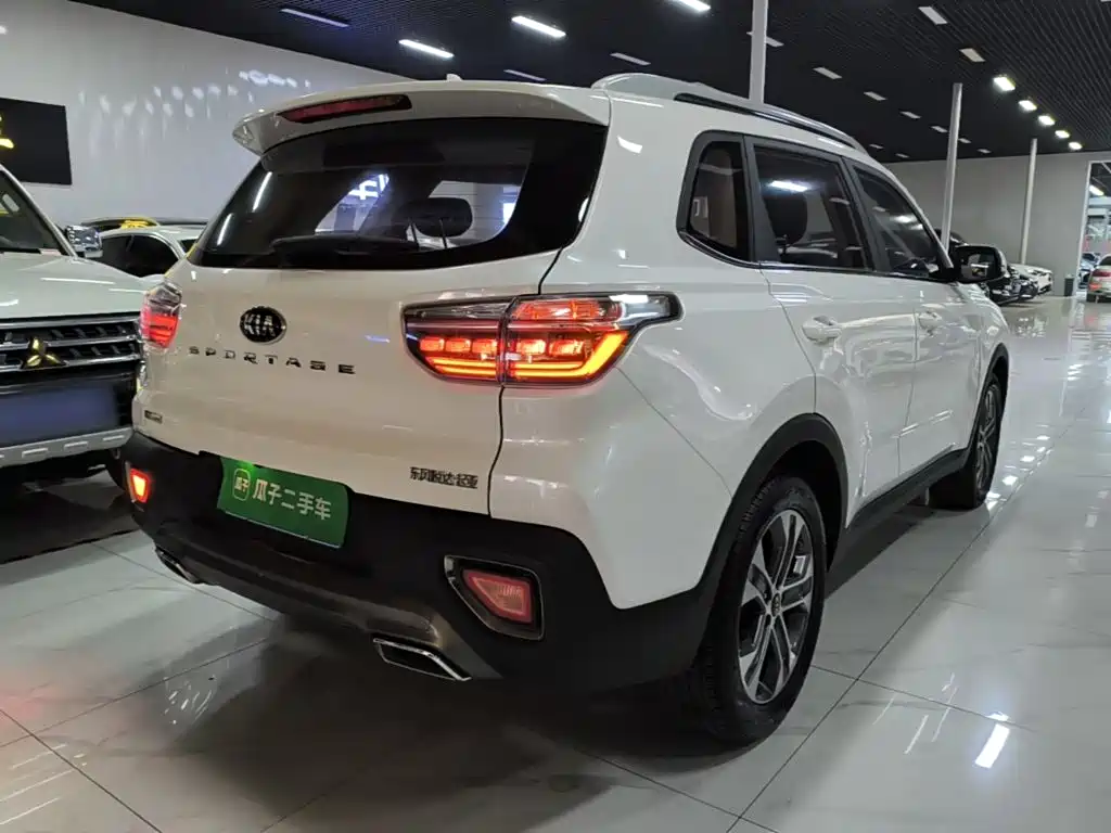 Kia Sportage — фото 7
