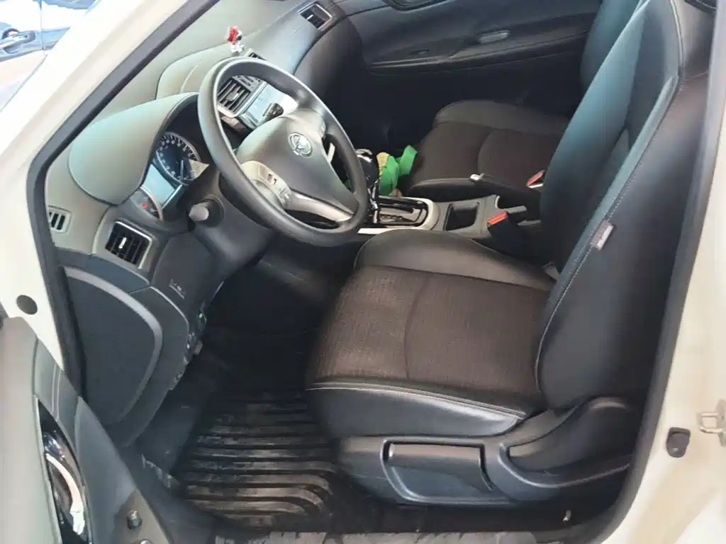 Nissan Tiida — фото 15