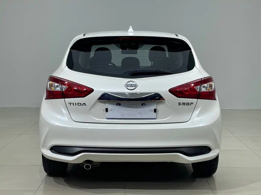 Nissan Tiida — фото 10