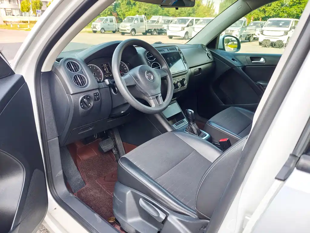Volkswagen Tiguan — фото 8