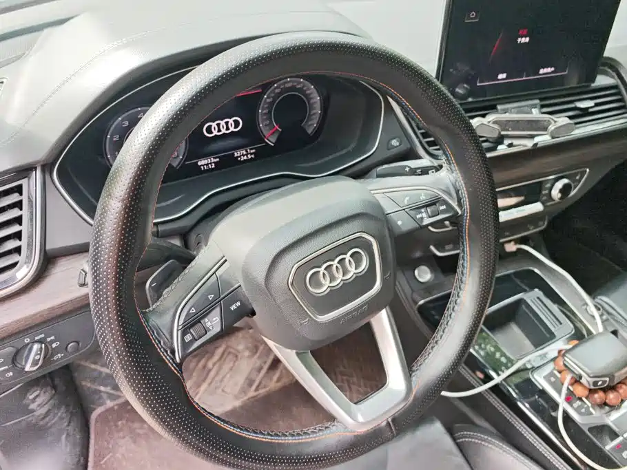 Audi Q5L — фото 15