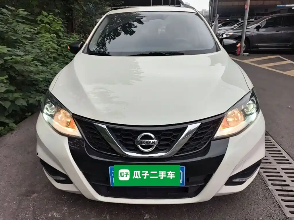 Nissan Tiida — фото 2