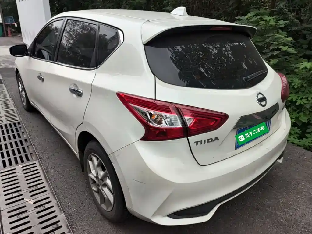 Nissan Tiida — фото 4