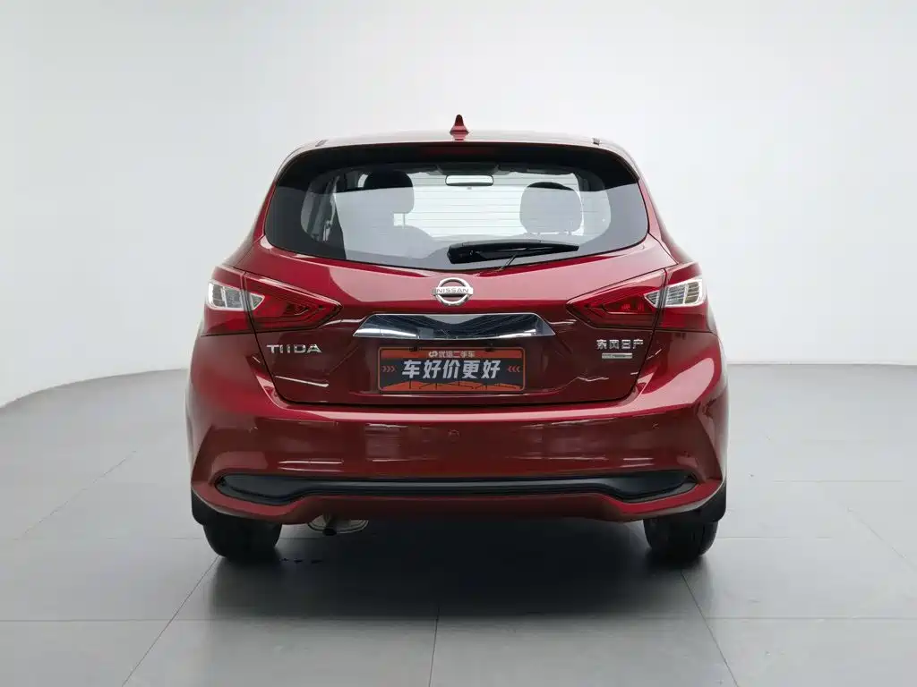 Nissan Tiida — фото 4