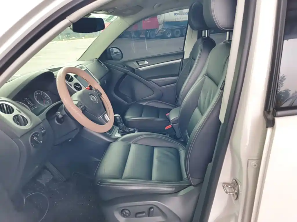 Volkswagen Tiguan — фото 10