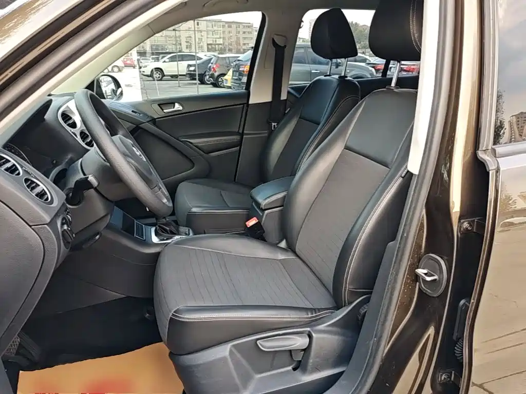 Volkswagen Tiguan — фото 14