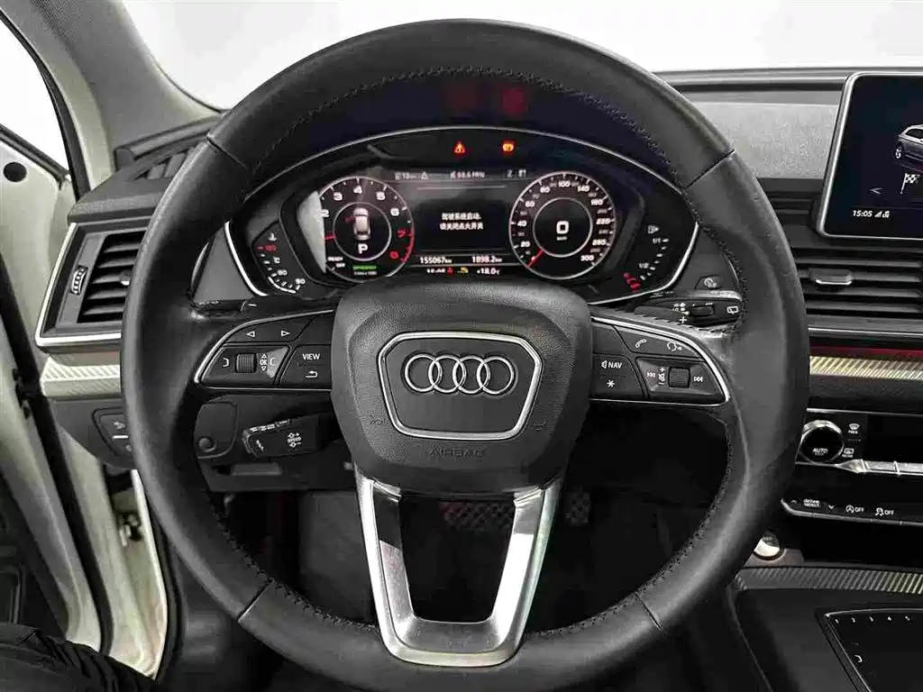 Audi Q5L — фото 8