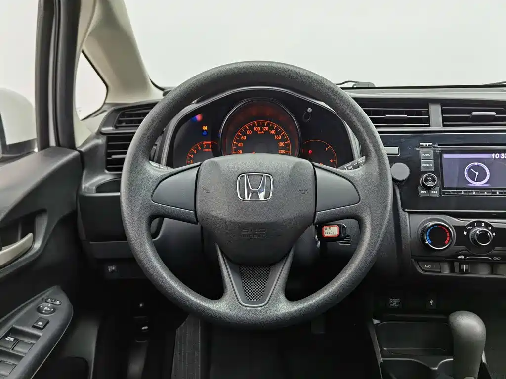 Honda Fit — фото 11
