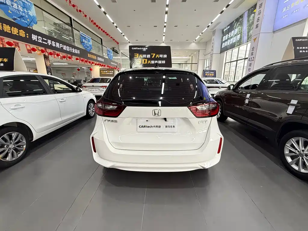 Honda Fit — фото 7