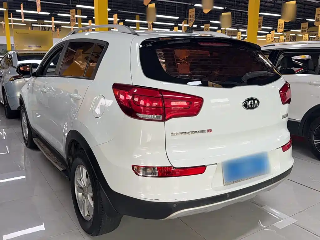 Kia Sportage — фото 6