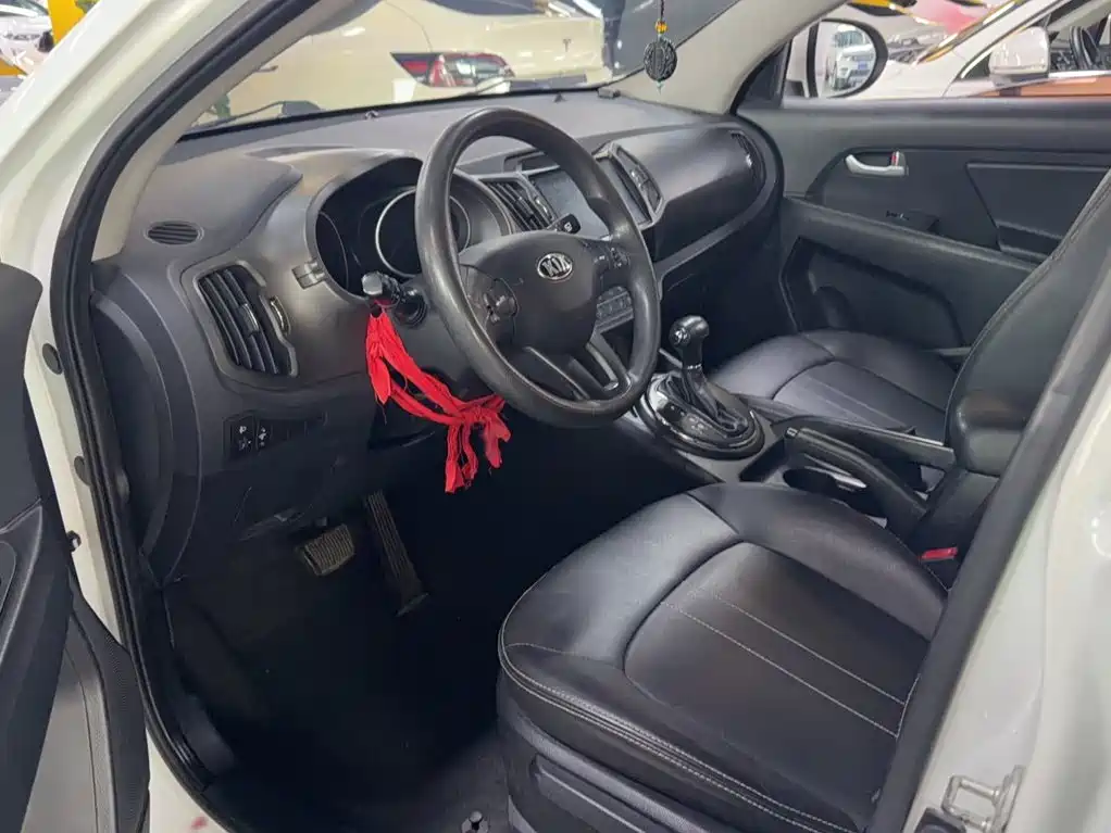 Kia Sportage — фото 7