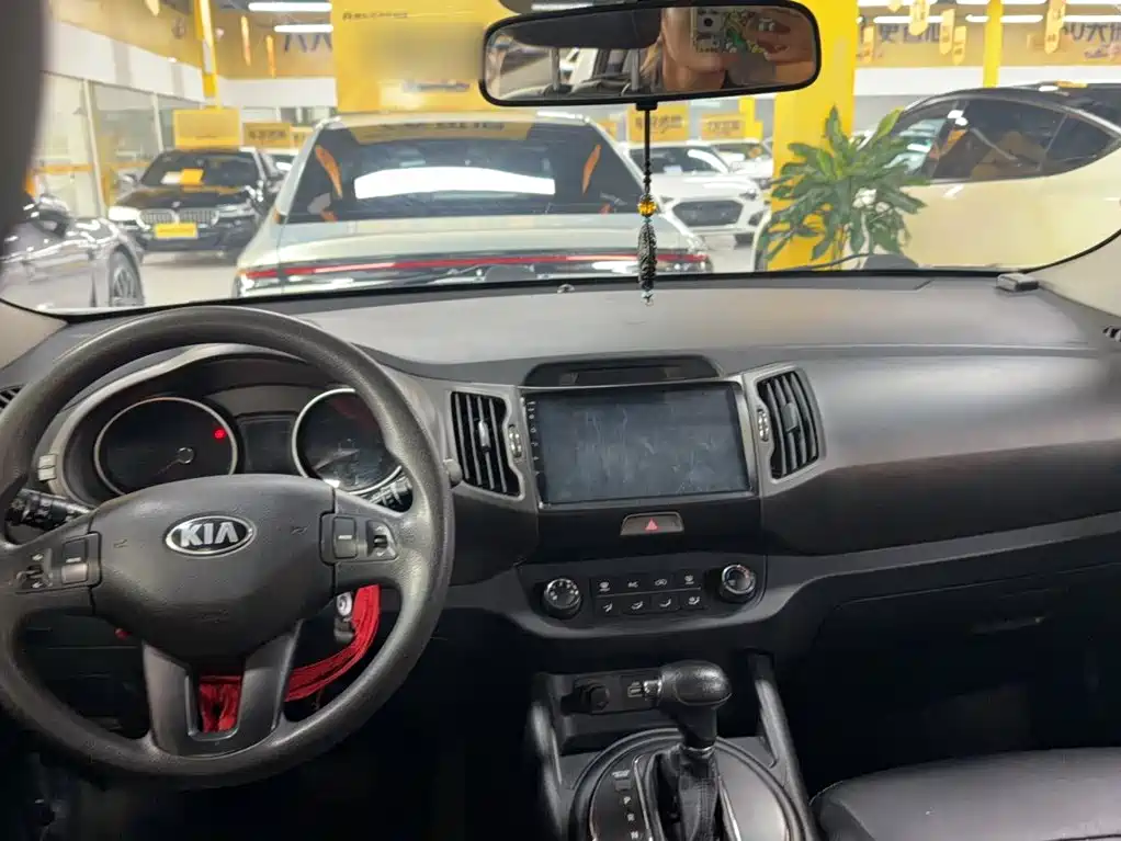 Kia Sportage — фото 9
