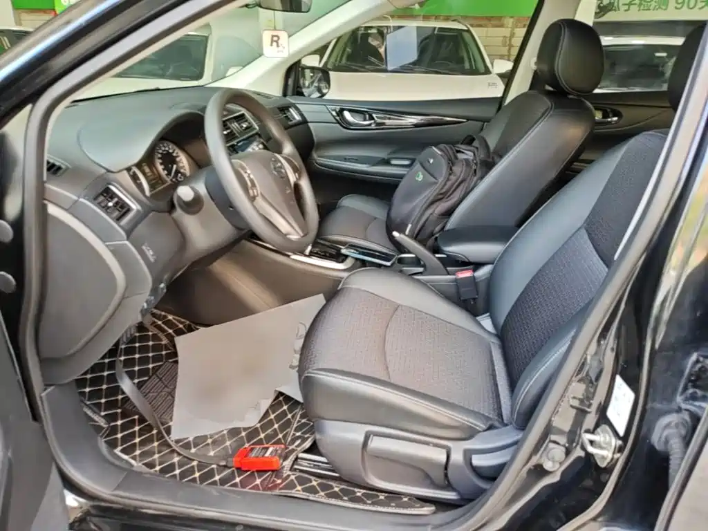 Nissan Tiida — фото 14