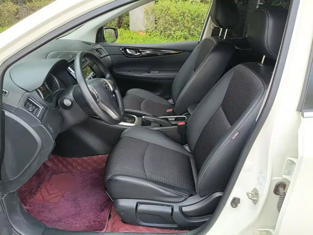 Nissan Tiida — фото 14