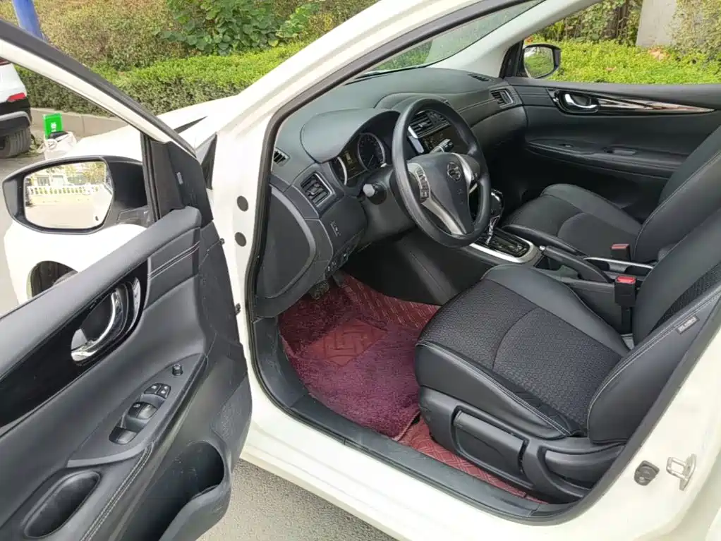 Nissan Tiida — фото 15