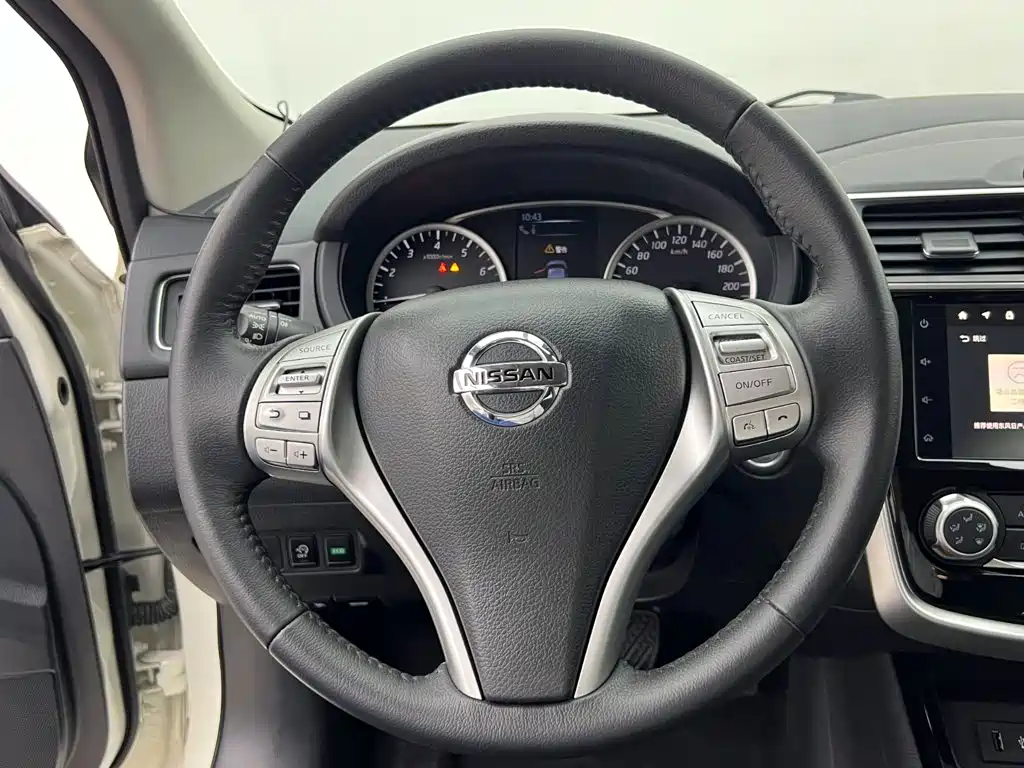 Nissan Tiida — фото 11