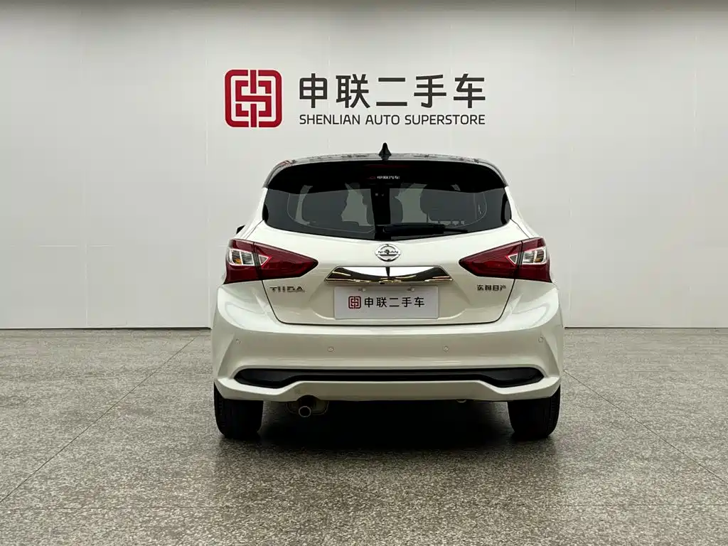 Nissan Tiida — фото 4