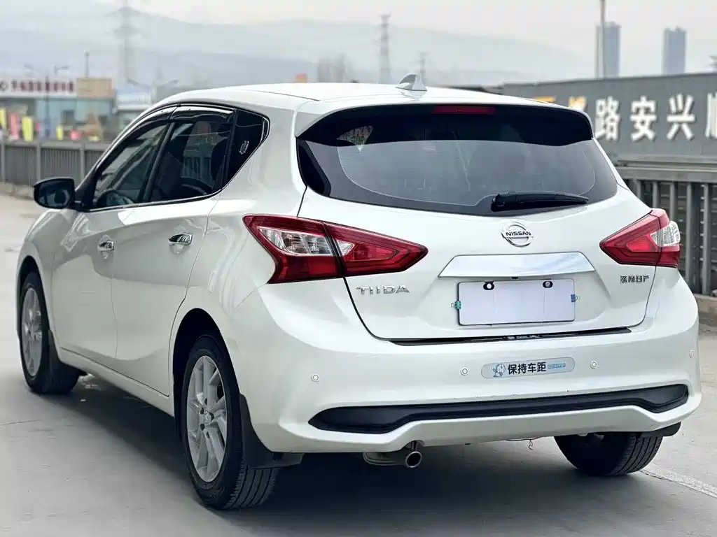 Nissan Tiida — фото 4