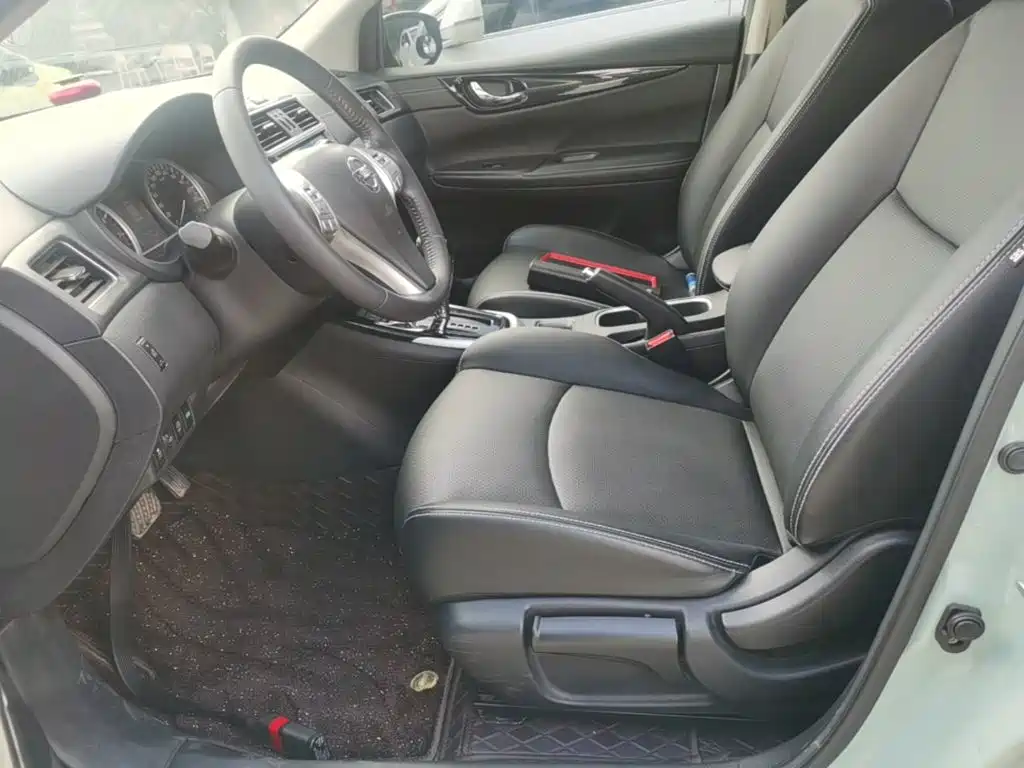 Nissan Tiida — фото 14