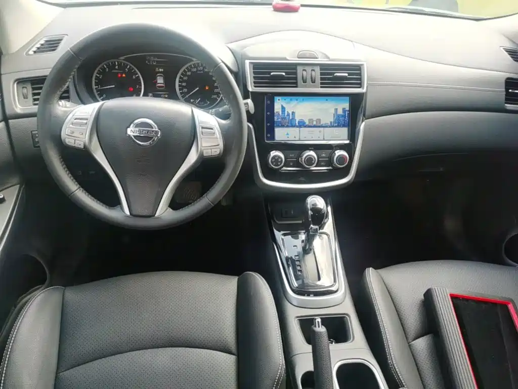 Nissan Tiida — фото 9