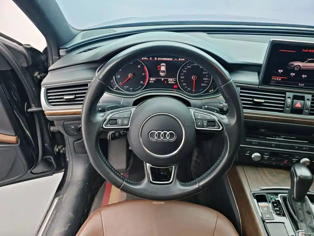 Audi A6L — фото 10
