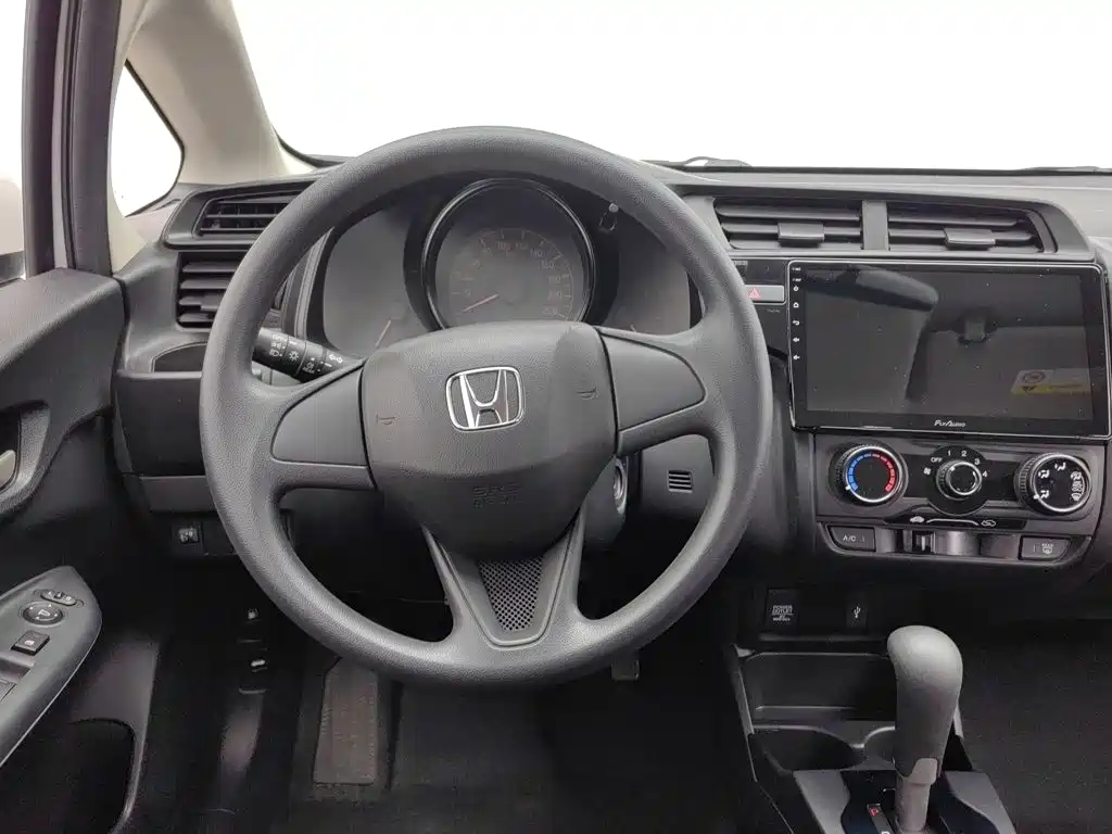 Honda Fit — фото 11