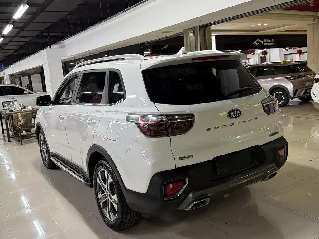 Kia Sportage — фото 9